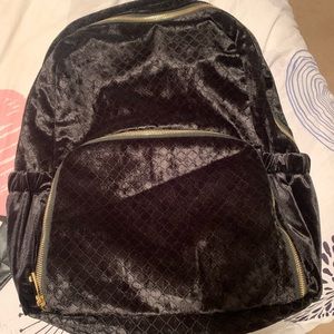 Black velvet backpack, never used